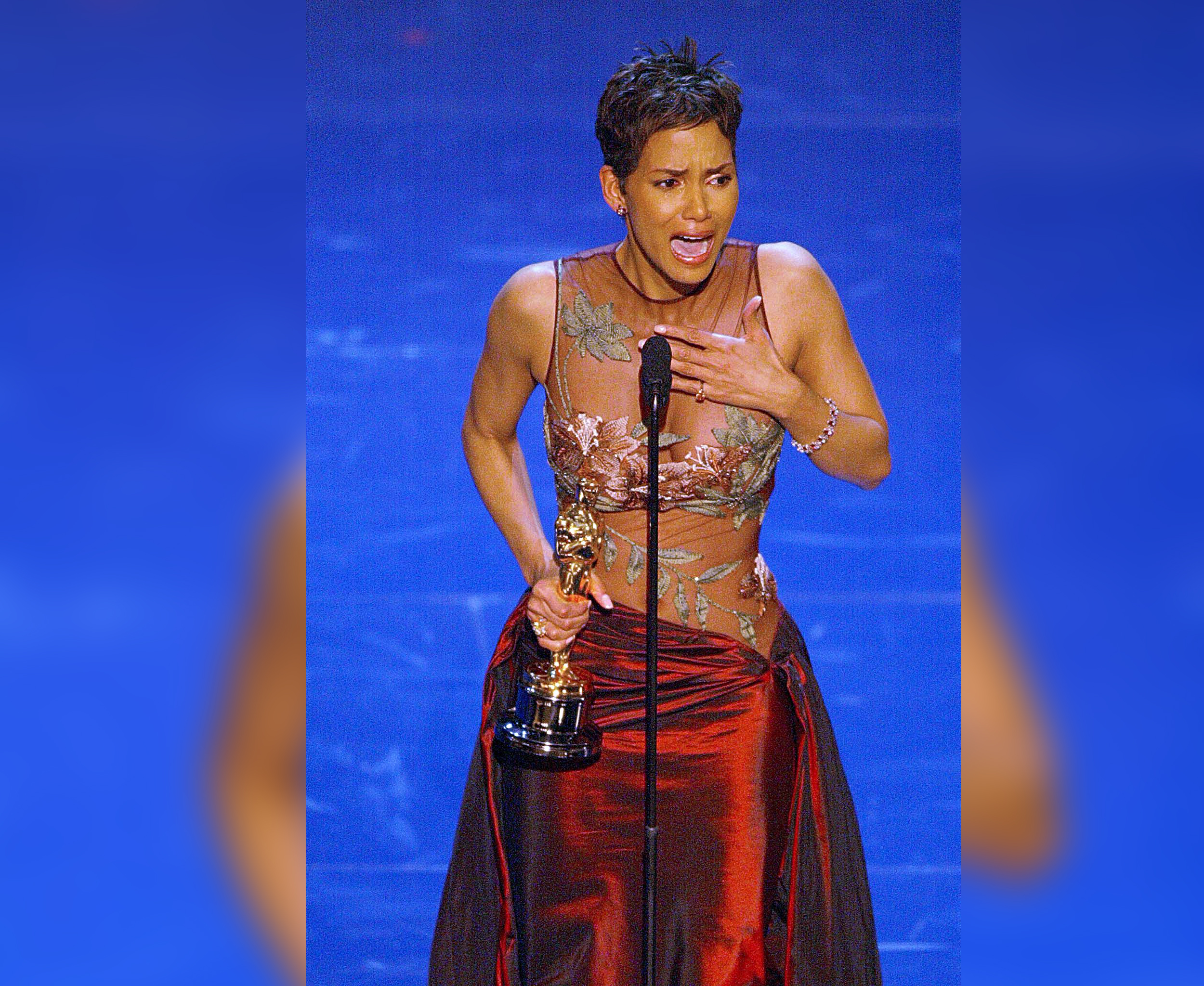PHOTO: Actress Halle Berry accepts her Oscar for Best performance by an actress in a leading role on March 24, 2002.