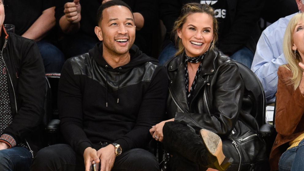 John Legend and Chrissy Teigen attend a basketball game between the Cleveland Cavaliers and the Los Angeles Lakers at Staples Center on March 10, 2016 in Los Angeles.