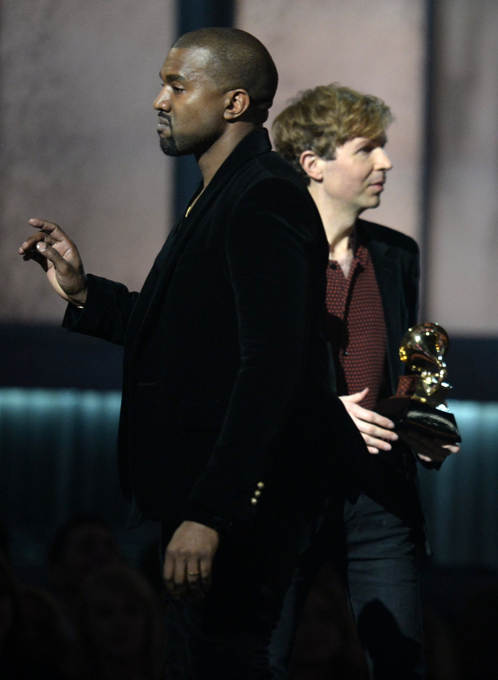 PHOTO: Winner for Album Of The Year Beck reacts as Kanye West appears on stage at the 57th Annual Grammy Awards in Los Angeles Feb. 8, 2015.
