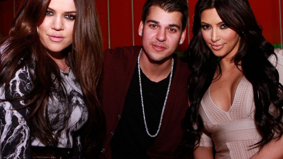 Khloe Kardashian,  Rob Kardashian and Kim Kardashian pose at Jet at The Mirage Hotel and Casino in Las Vegas, March 18, 2011.