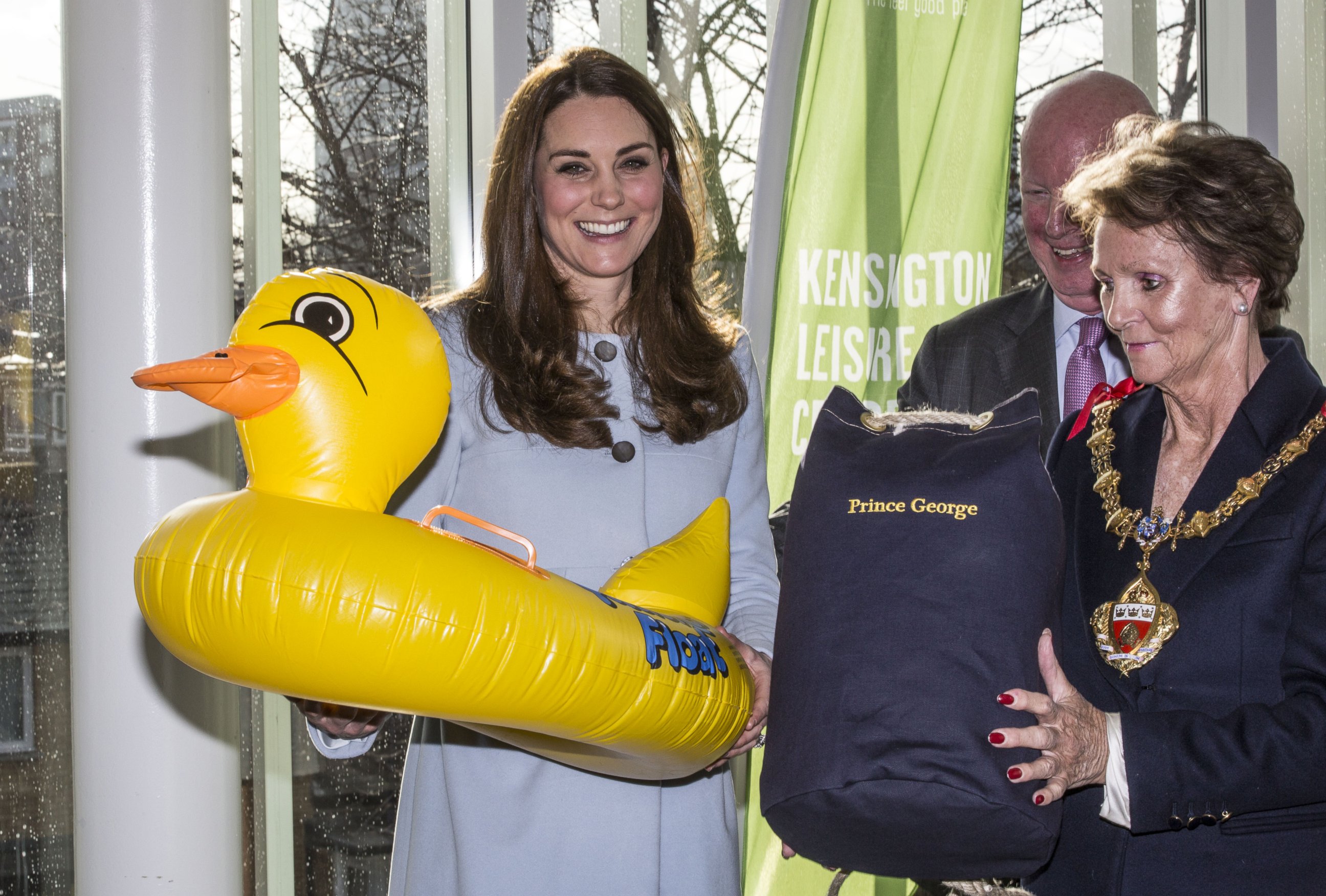 PHOTO: Catherine, Duchess of Cambridge is presented with an inflatable duck for Prince George during her tour of the new Kensington Leisure Centre on Jan. 19, 2015 in London, England.