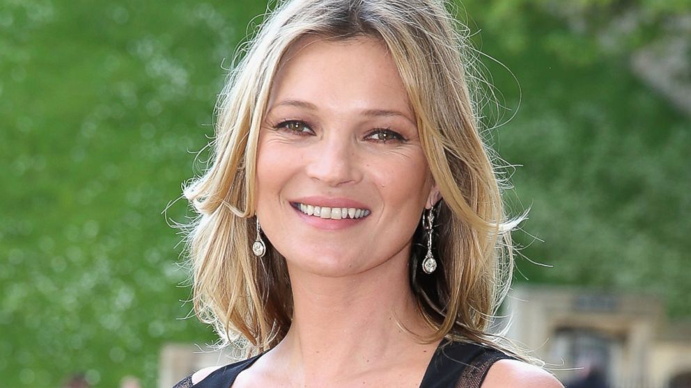 PHOTO: Kate Moss arrives for a dinner to celebrate the work of The Royal Marsden hosted by the Duke of Cambridge at Windsor Castle on May 13, 2014 in Windsor, England. 