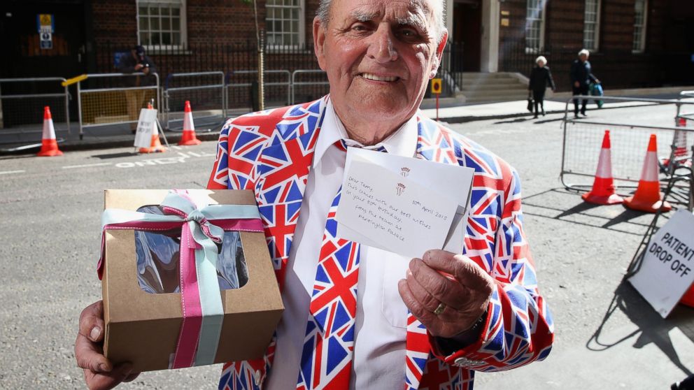 Royalist Terry Hutt poses with a cake and card he received from Kensington Palace on his 80th Birthday as he continues his wait for a new Royal baby at the Lindo wing, April 30, 2015 in London, England. 