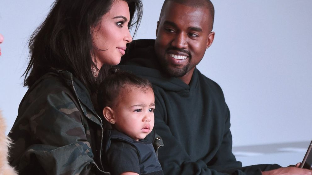Kim Kardashian, North West and Kanye West attend Mercedes-Benz Fashion Week Fall 2015 on Feb. 12, 2015 in New York.