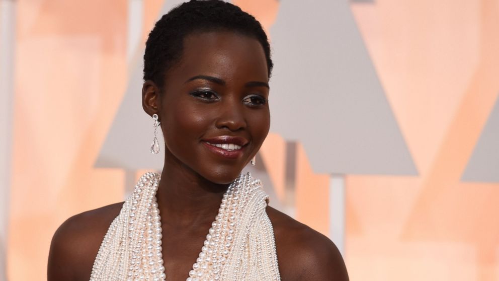 Actress Lupita Nyong'o arrives on the red carpet for the 87th Oscars, Feb.22, 2015, in Hollywood, Calif. 