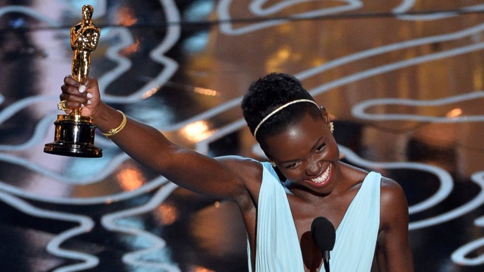 Actress Lupita Nyong'o accepts the Best Performance by an Actress in a Supporting Role award for '12 Years a Slave' onstage during the Oscars at the Dolby Theatre on March 2, 2014 in Hollywood, California.  