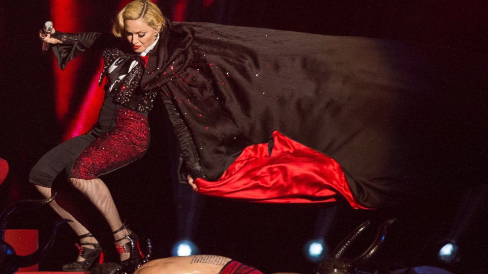 Madonna falls as she performs on stage for the BRIT Awards 2015 at The O2 Arena on Feb. 25, 2015 in London, England.