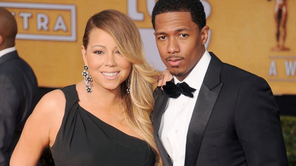 Singer Mariah Carey and actor/TV personality  Nick Cannon arrive at the 20th Annual Screen Actors Guild Awards at The Shrine Auditorium, Jan. 18, 2014 in Los Angeles, Calif.