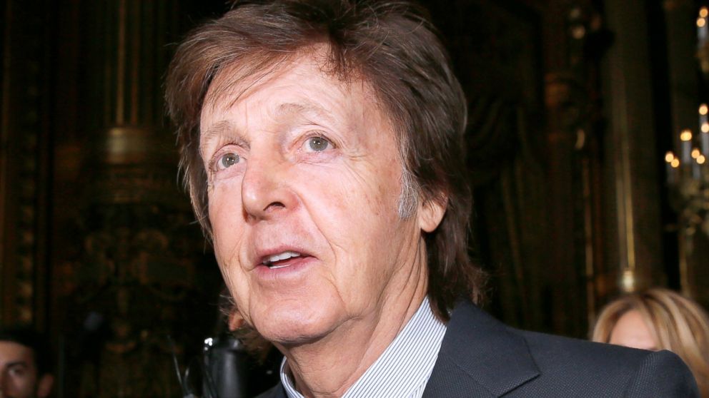 Former Beatle and recording artist Sir Paul McCartney attends a fashion show on March 7, 2016 in Paris.