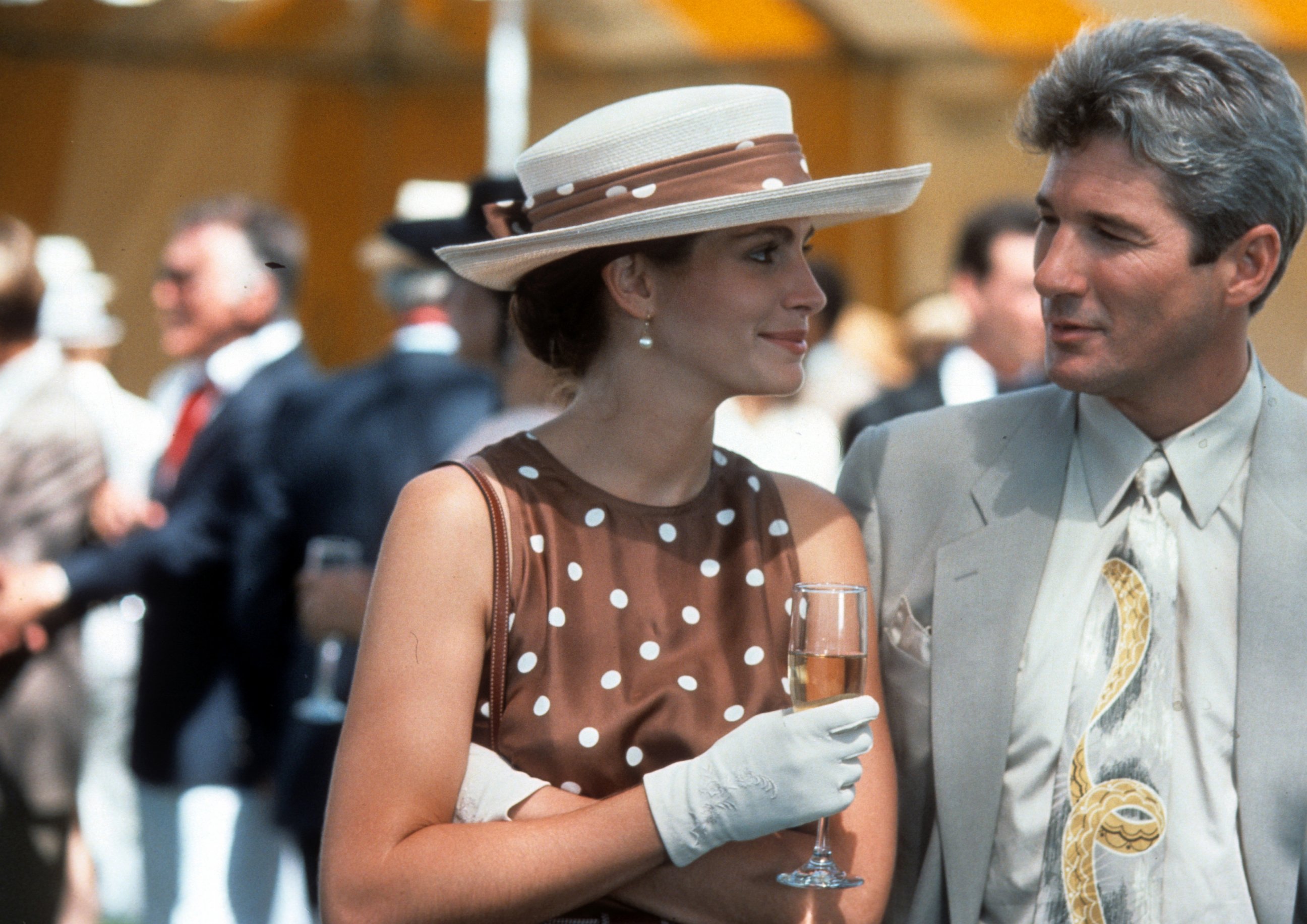 PHOTO: Julia Roberts has a drink with Richard Gere in a scene from the film 'Pretty Woman', 1990. 
