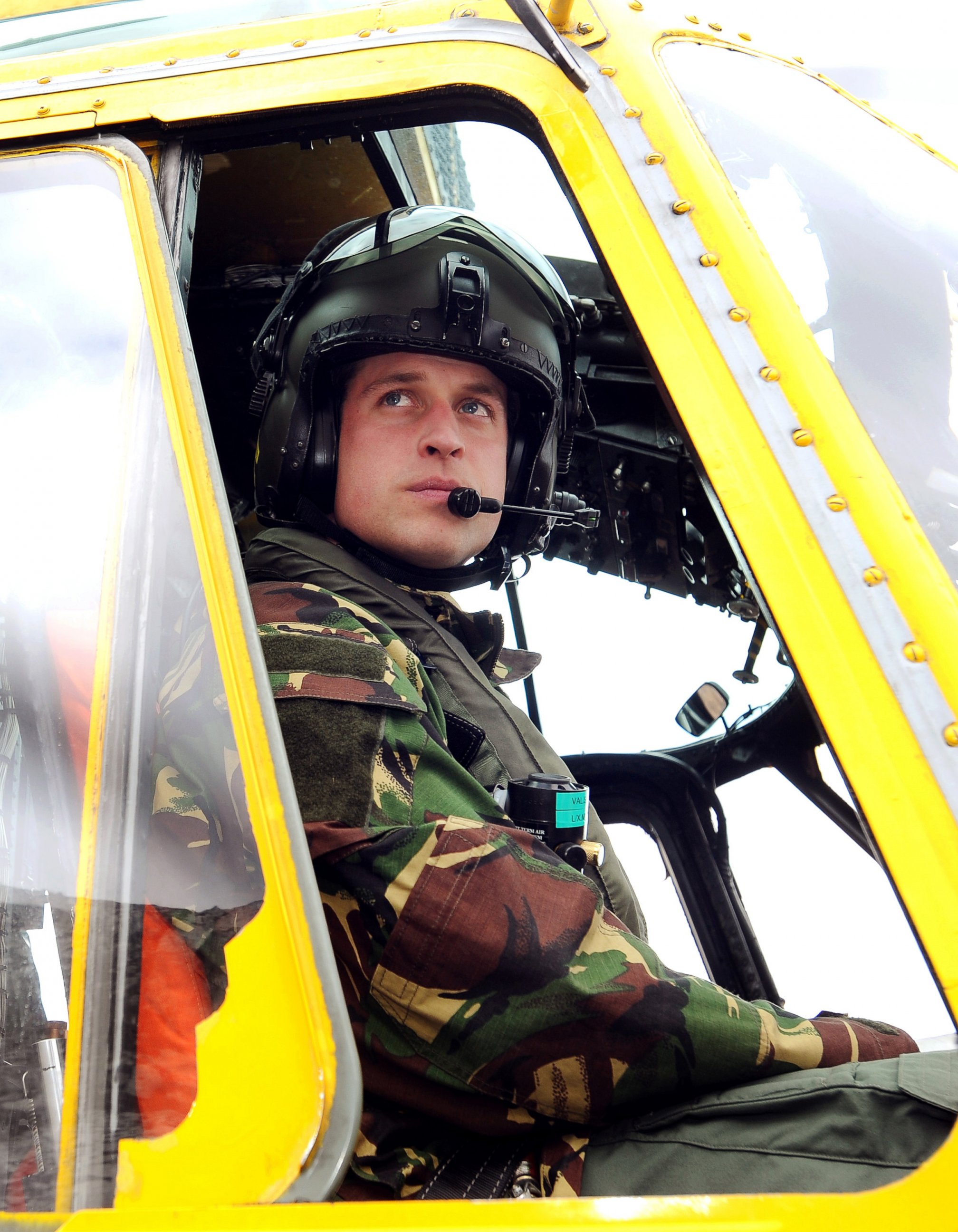 PHOTO: Prince William is seen at the controls of a Sea King helicopter during a training exercise at Holyhead Mountain, north Wales on March 31, 2011.