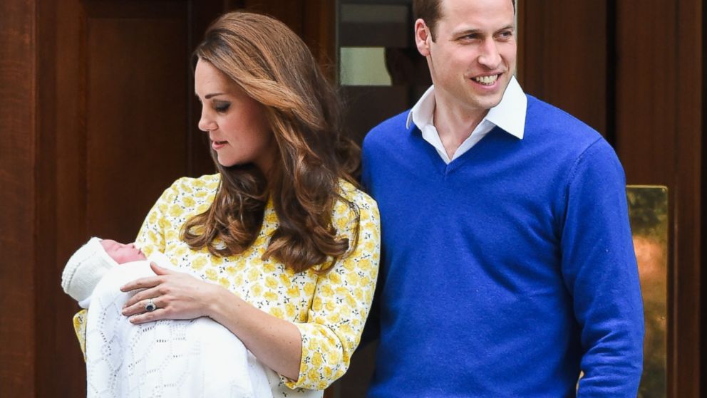 Prince William, Duke of Cambridge and Catherine, Duchess of Cambridge depart the Lindo Wing with their newborn baby daughter Charlotte at St Mary's Hospital, May 2, 2015, in London.