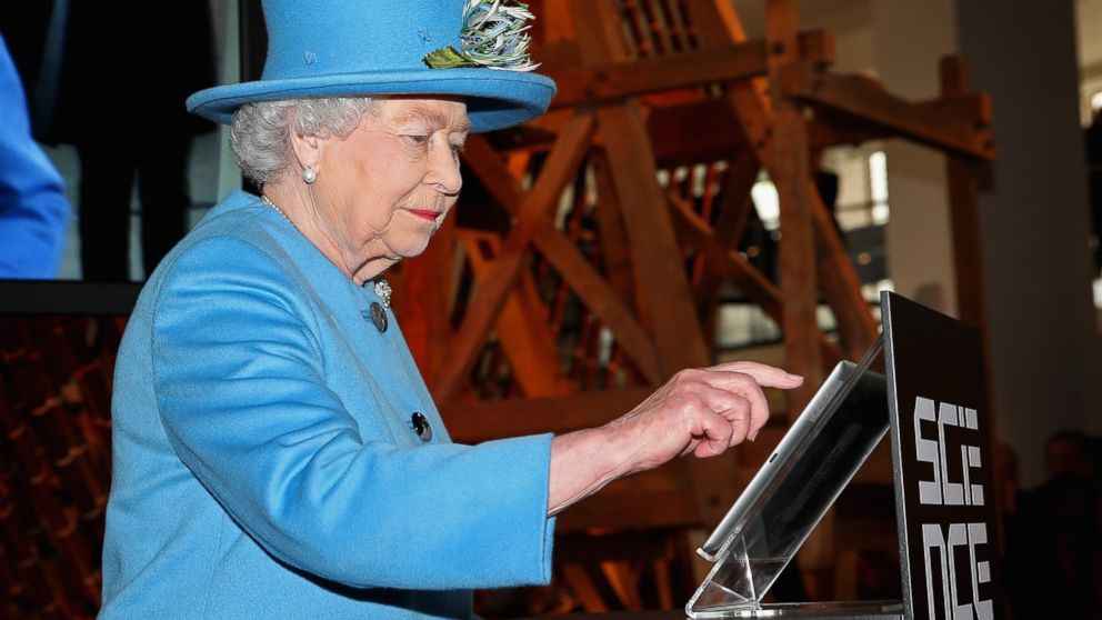 PHOTO: Queen Elizabeth II sends her first Tweet during a visit to the Science Museum on Oct. 24, 2014 in London, England.