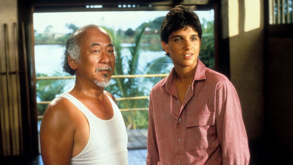 PHOTO: Pat Morita and Ralph Macchio in a scene from the film 'The Karate Kid', 1984.