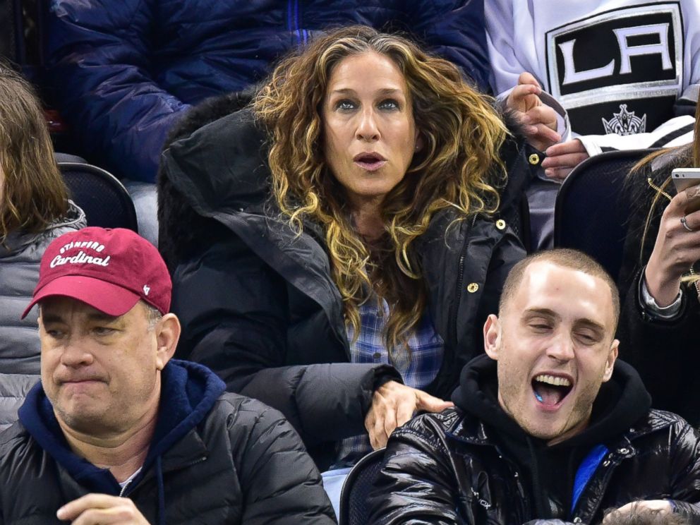 PHOTO: Tom Hanks and Sarah Jessica Parker attend the Los Angeles Kings vs New York Rangers game at Madison Square Garden on March 24, 2015 in New York City.