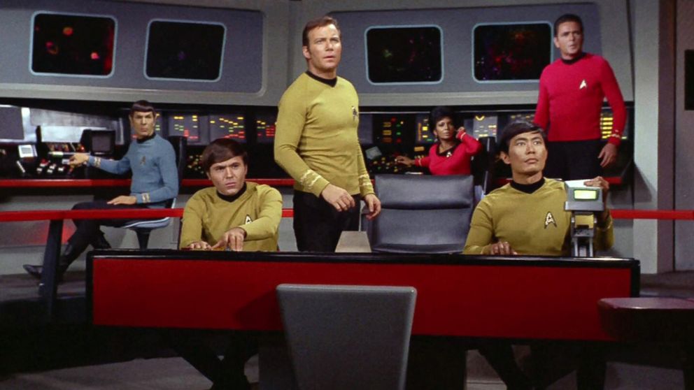 Leonard Nimoy as Mr. Spock, Walter Koenig as Pavel Chekov, William Shatner as Captain James T. Kirk, Nichelle Nichols as Uhura, George Takei as Hikaru Sulu and James Doohan as Montgomery "Scotty" Scott in a scene from Star Trek.