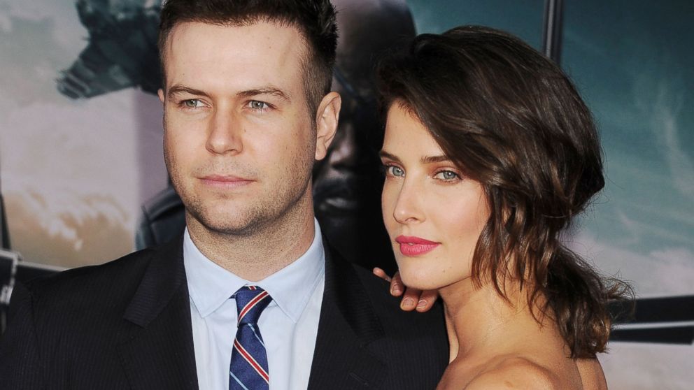 Cobie Smulders and husband Taran Killam attend a movie premiere at the El Capitan Theatre on March 13, 2014 in Hollywood, Calif.