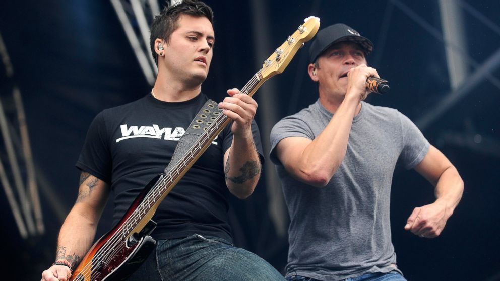 Rock singer Brad Arnold of 3 Doors Down, right, performs on stage with bass player Justin Biltonen during the Hellfest Heavy Music Festival on June 22, 2013 in Clisson, France. 