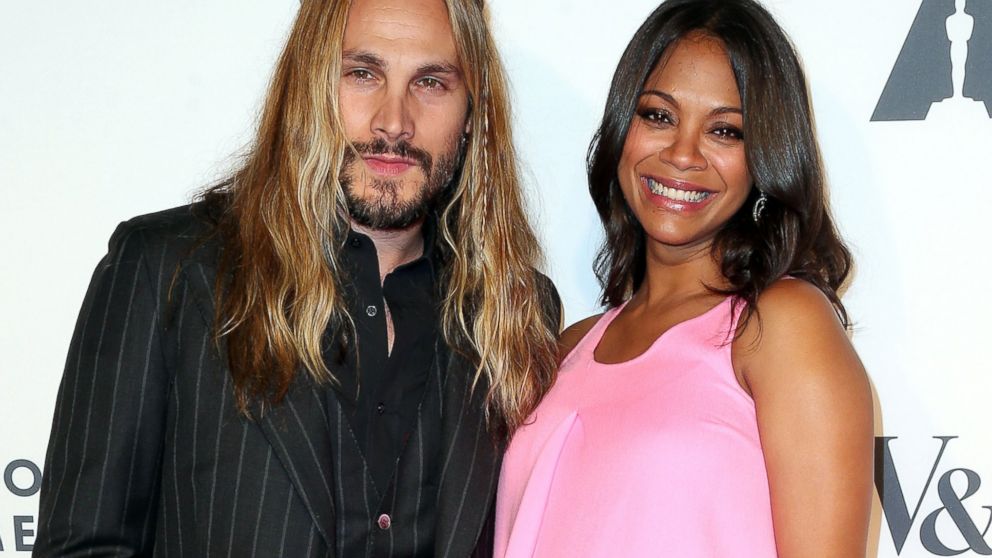 Marco Perego and Zoe Saldana attend The Academy of Motion Picture Arts and Sciences' Hollywood Costume Opening Party at  the Wilshire May Company Building on Oct. 1, 2014 in Los Angeles, Calif.