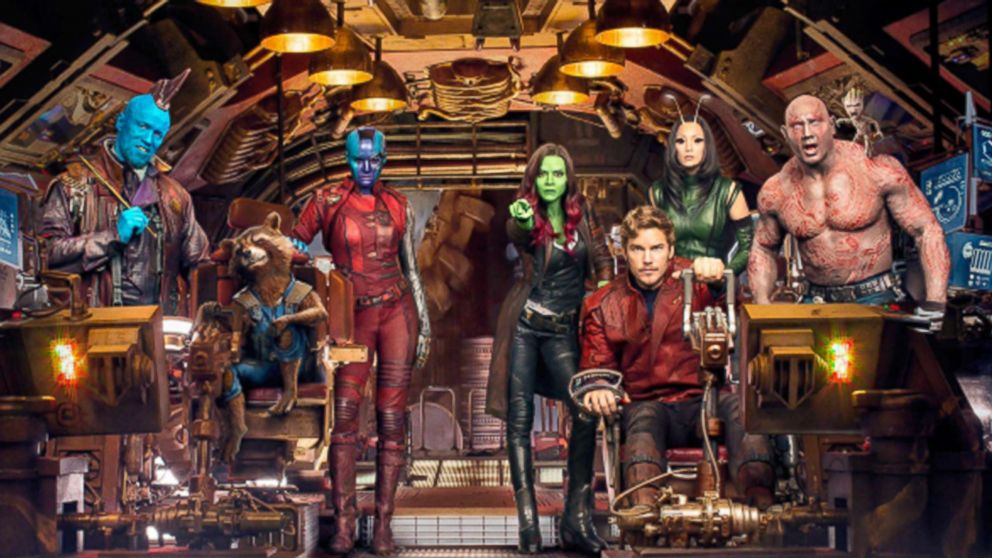 Vin Diesel, Bradley Cooper, Chris Pratt, Michael Rooker, Zoe Saldana, Dave Bautista, Karen Gillan, and Pom Klementieff pose for a cast photo for "Guardians of the Galaxy."
