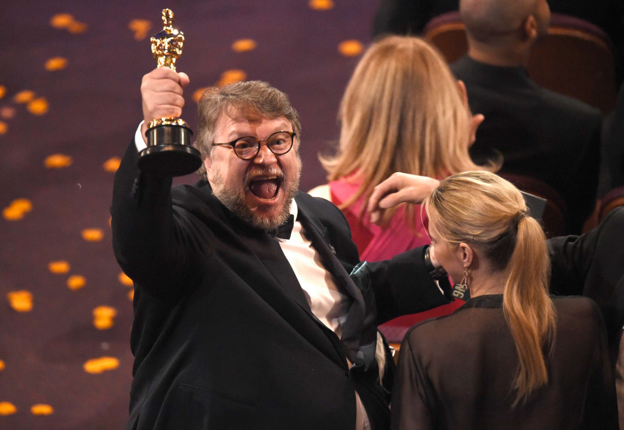 PHOTO: Guillermo del Toro, winner of the award for best director for "The Shape of Water" celebrates in the audience at the Oscars, March 4, 2018, at the Dolby Theatre in Los Angeles.