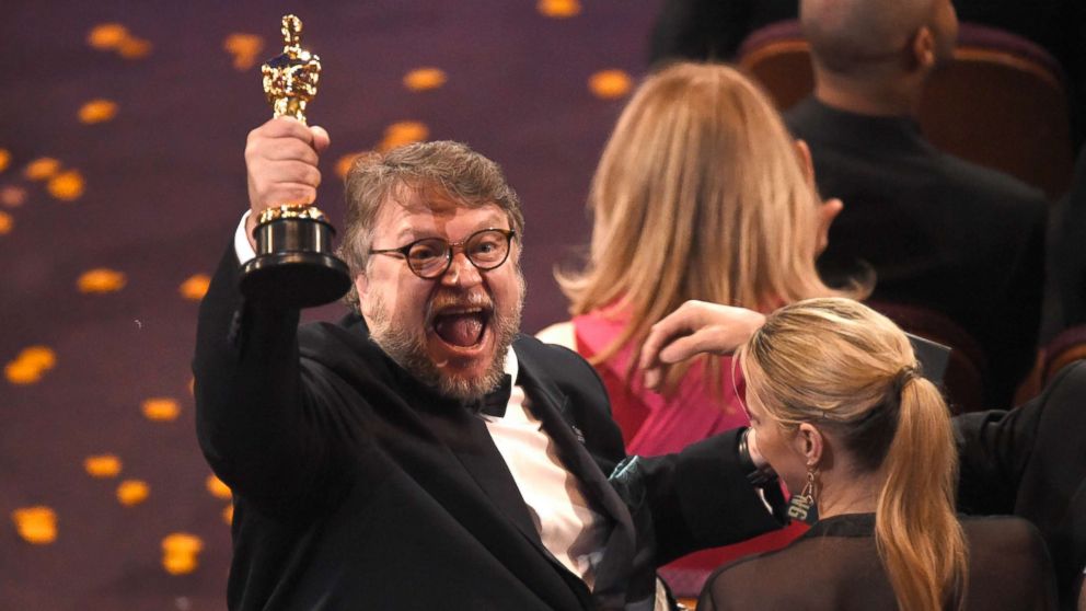 PHOTO: Guillermo del Toro, winner of the award for best director for "The Shape of Water" celebrates in the audience at the Oscars, March 4, 2018, at the Dolby Theatre in Los Angeles.