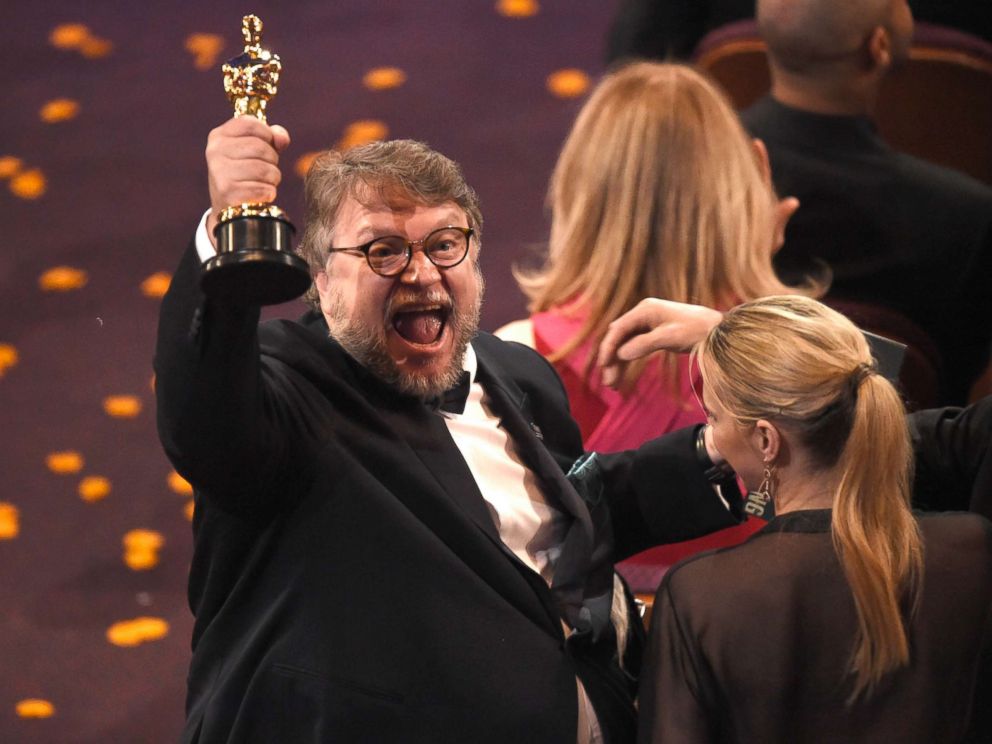 PHOTO: Guillermo del Toro, winner of the award for best director for The Shape of Water celebrates in the audience at the Oscars, March 4, 2018, at the Dolby Theatre in Los Angeles.