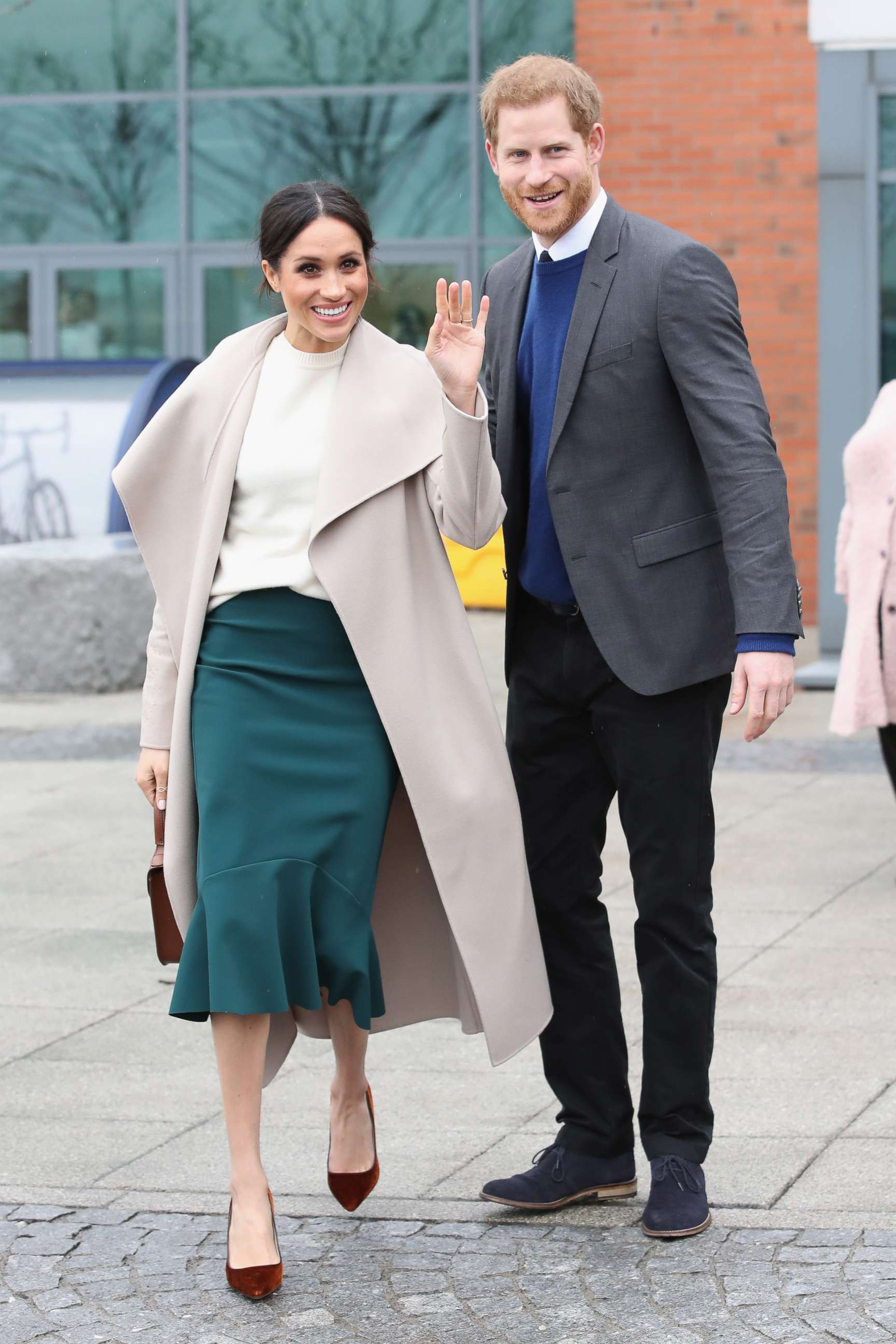 PHOTO: Meghan Markle and Prince Harry depart from Catalyst Inc, Northern Ireland's next generation science park, March 23, 2018, in Belfast, Northern Ireland.  