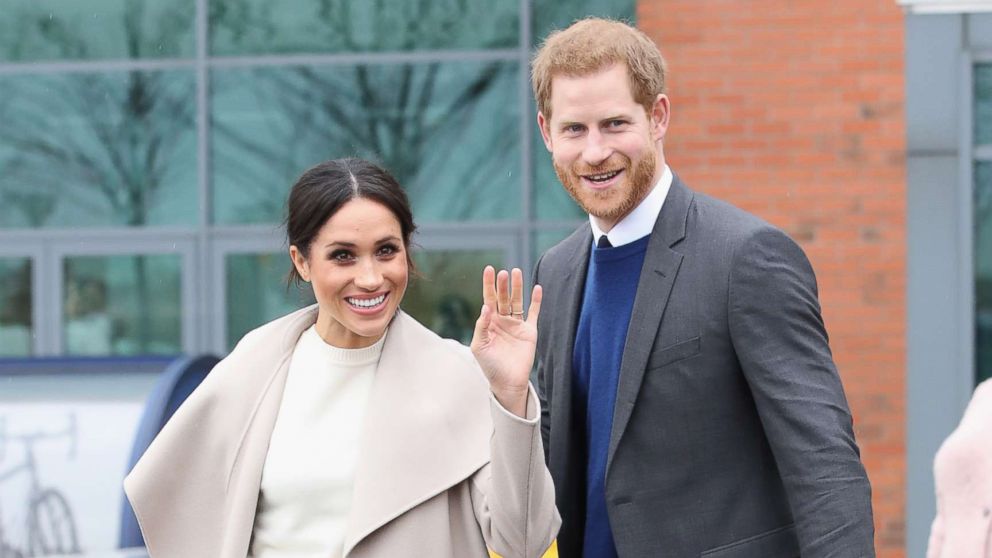 PHOTO: Meghan Markle and Prince Harry depart from Catalyst Inc, Northern Ireland's next generation science park, March 23, 2018, in Belfast, Northern Ireland. 