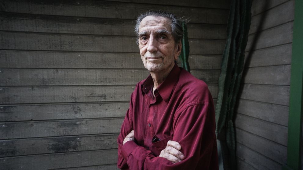 Actor Harry Dean Stanton stands outside of his home, Feb. 23, 2015, in Los Angeles.