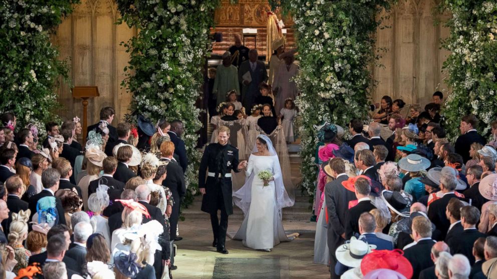 Prince Harry and Meghan Markle leave St George's Chapel at Windsor Castle after their wedding in Windsor, May 19, 2018.