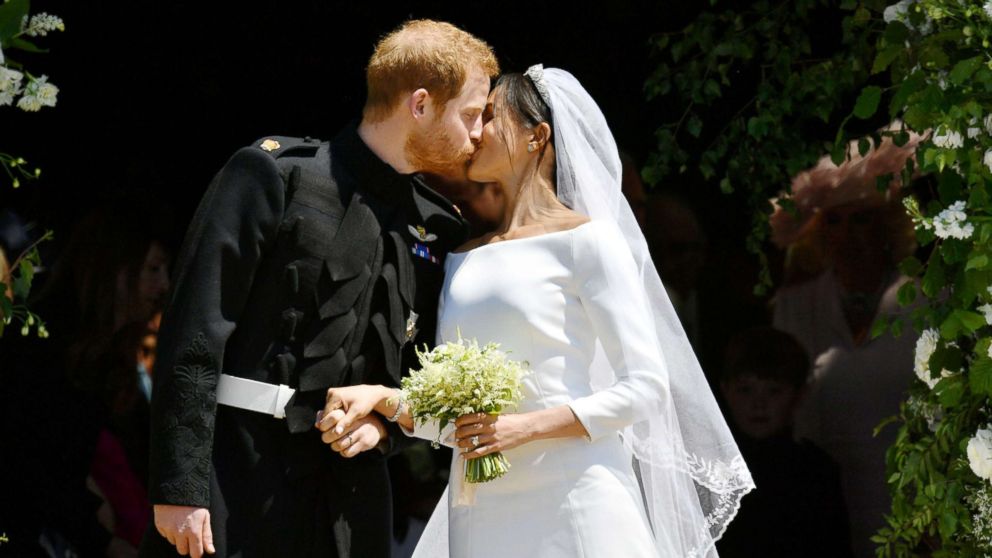 PHOTO: Prince Harry and Meghan Markle kiss on the steps of St George's Chapel in Windsor Castle after their wedding, May 19, 2018.