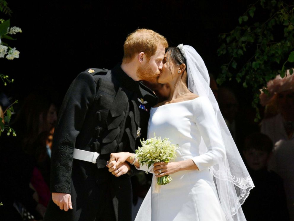 PHOTO: Prince Harry and Meghan Markle kiss on the steps of St. George's Chapel in Windsor Castle after their wedding on May 19, 2018.