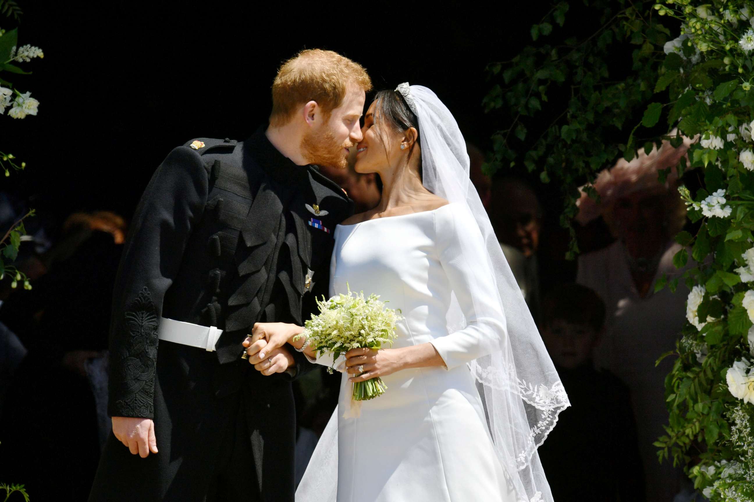 PHOTO: Prince Harry and Meghan Markle kiss on the steps of St George's Chapel in Windsor Castle after their wedding in Windsor, Britain, May 19, 2018.