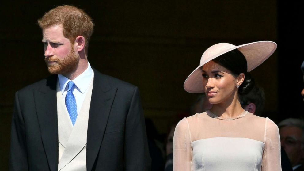Britain's Prince Harry and Meghan, Duchess of Sussex attend a garden party at Buckingham Palace, their first royal engagement as a married couple, in London, May 22, 2018.