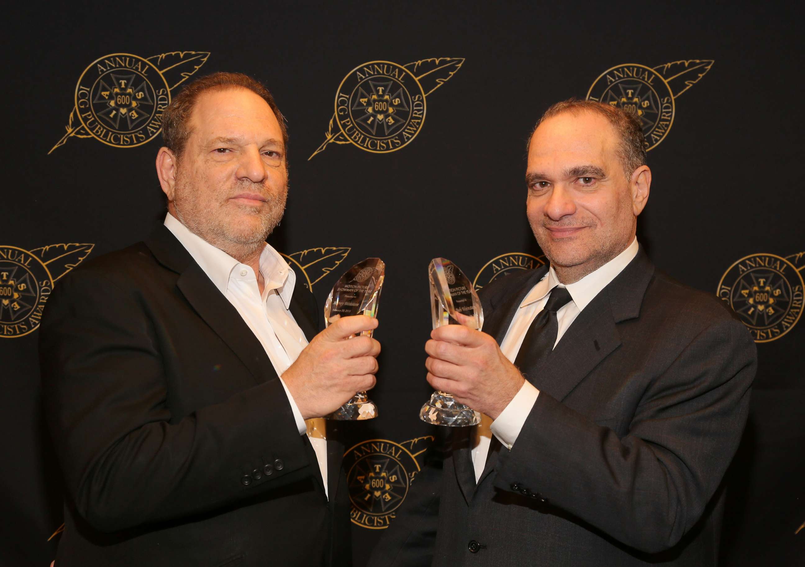 PHOTO: Harvey Weinstein (L) and Bob Weinstein pose with the Motion Picture Showmanship Award backstage at the 52nd Annual ICG Publicists Awards at The Beverly Hilton Hotel, Feb. 20, 2015 in Beverly Hills, Calif. 
