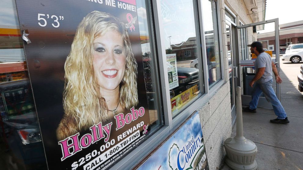 PHOTO: In this Sept. 9, 2014, file photo, a poster offering a reward for information in the disappearance of Holly Bobo, is displayed in a store window in Parsons, Tenn.