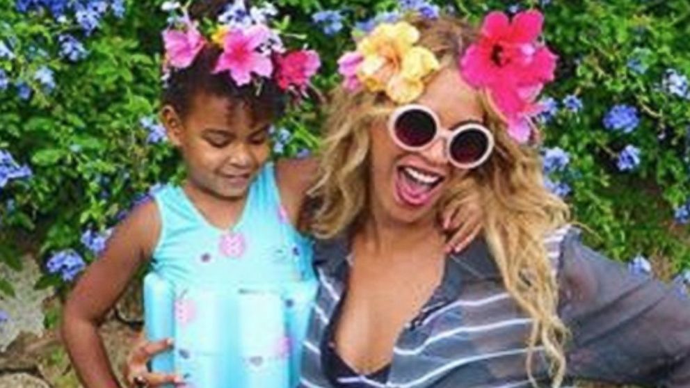 Beyonce and her daughter, Blue Ivy, wear stylish flowers in their hair in this Instagram photo posted by Beyonce, Sept. 17, 2015. 