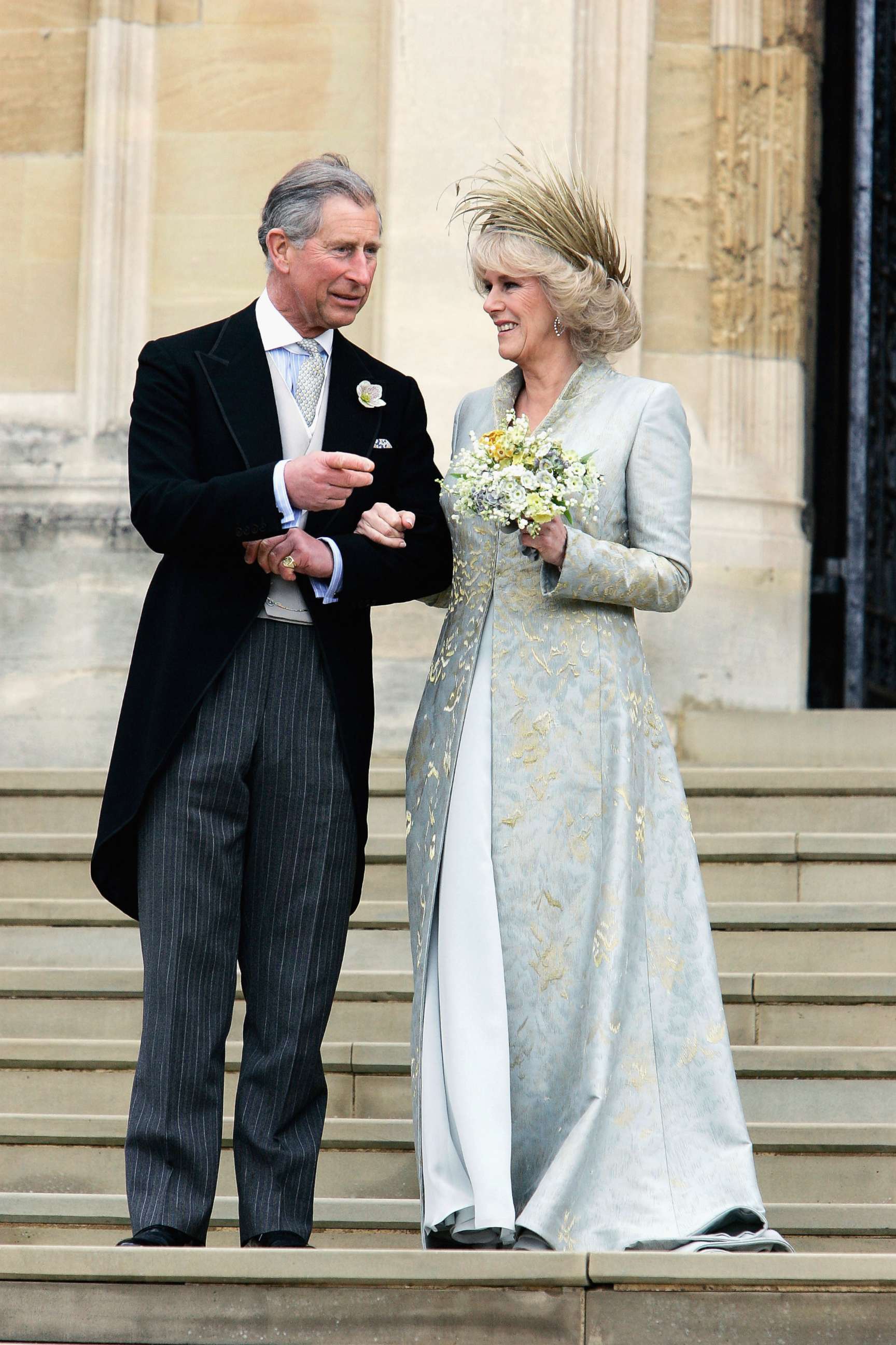 PHOTO: Prince Charles, and Camilla leave the Service of Prayer and Dedication blessing their marriage at Windsor Castle on April 9, 2005 in Berkshire, England. 
