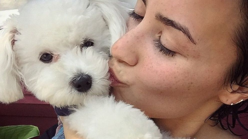 Demi Lovato is seen with her dog in this photo posted to Instagram on April 13, 2015. 