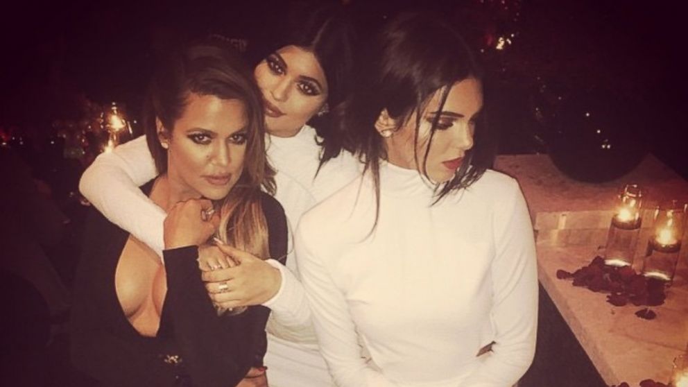 Khloe Kardashian, left, poses with her sisters Kylie, center, and Kendall Jenner in a photo she posted on Instagram, Dec. 24, 2014. 