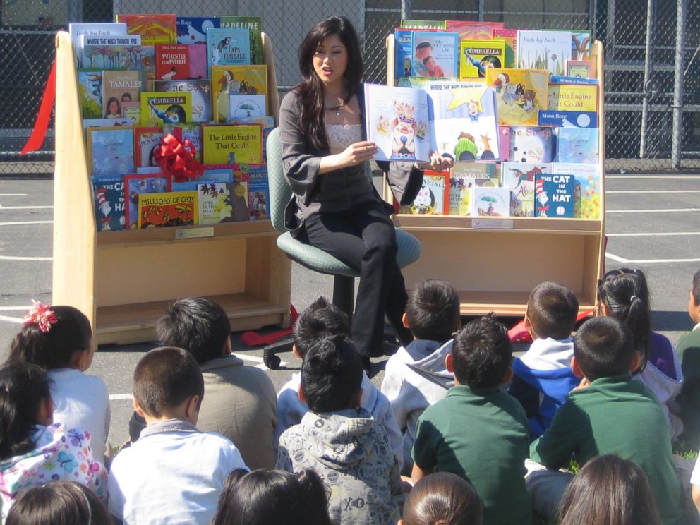 PHOTO: Champion figure skater Kristi Yamaguchi reads to children in a photo posted to the "Kristi Yamaguchi's Always Dream Foundation" Facebook page in 2012.
