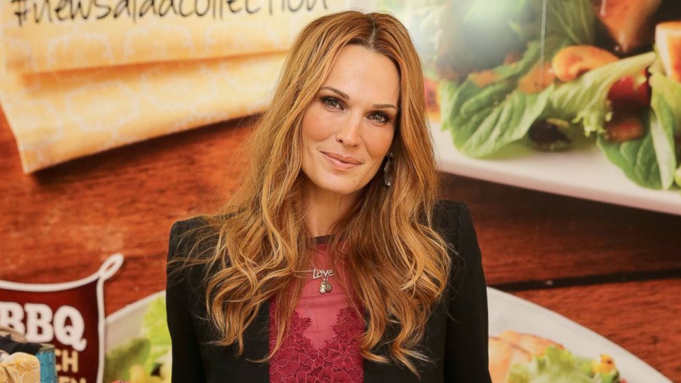 Actress and Fashion Icon Molly Sims adds style to Wendy's new salad collection at an exclusive fashion event to celebrate their new Asian Cashew Chicken and BBQ Ranch Chicken Salads and kick off online style board contests where Molly will be the judge, March 19, 2014 in New York City.