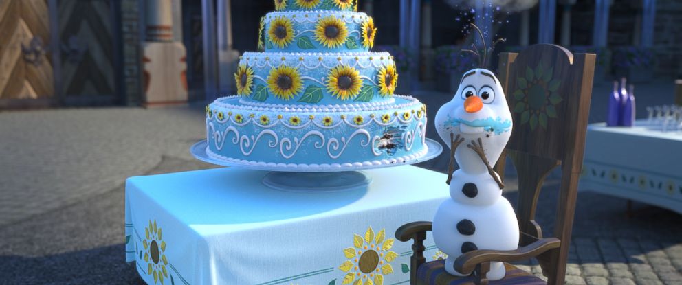 PHOTO: Olaf sneaks a taste of Anna's birthday cake in "Frozen Fever," a short from Disney.