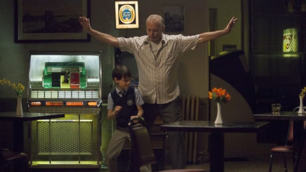 Jaeden Lieberher, left, and Bill Murray, right, are pictured in a still from "St. Vincent."
