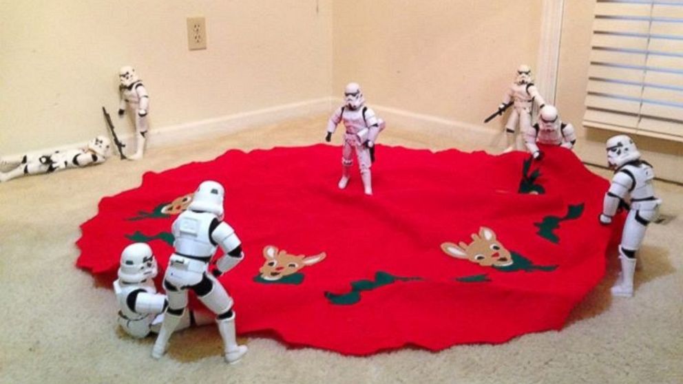 Father and son Phil and Kyle Shearrer enlisted the help of "Star Wars" stormtrooper figurines to assemble the family Christmas tree.