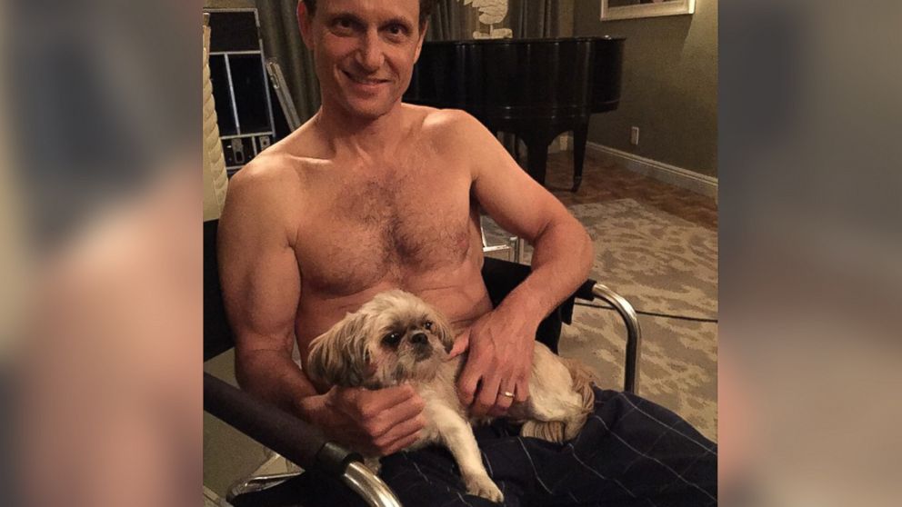 Scott Foley posted this photo to Instagram on Oct. 1, 2014 with the caption, "Thanks @Tonygoldwyn for making sure I'm not the only shirtless guy holding a dog. IOU!"