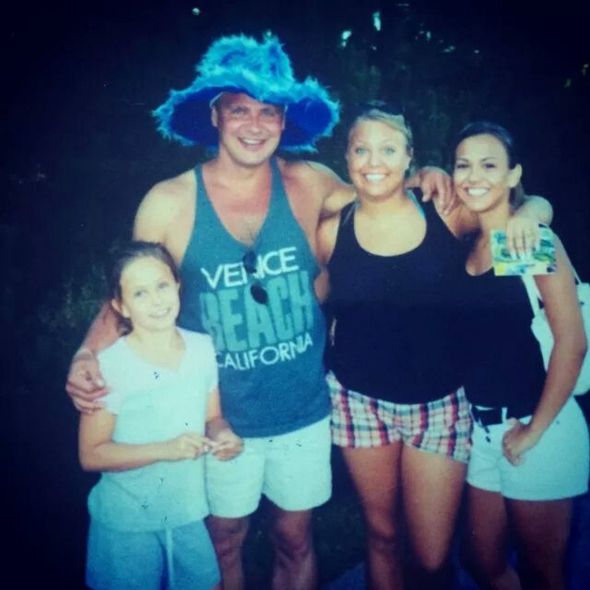 PHOTO: Michael Vedvik is photographed with his three daughters in an undated photo.
