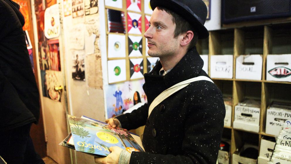 PHOTO: Elijah Wood is pictured waiting to check out at A1 Records in New York City on Jan. 19, 2015. 