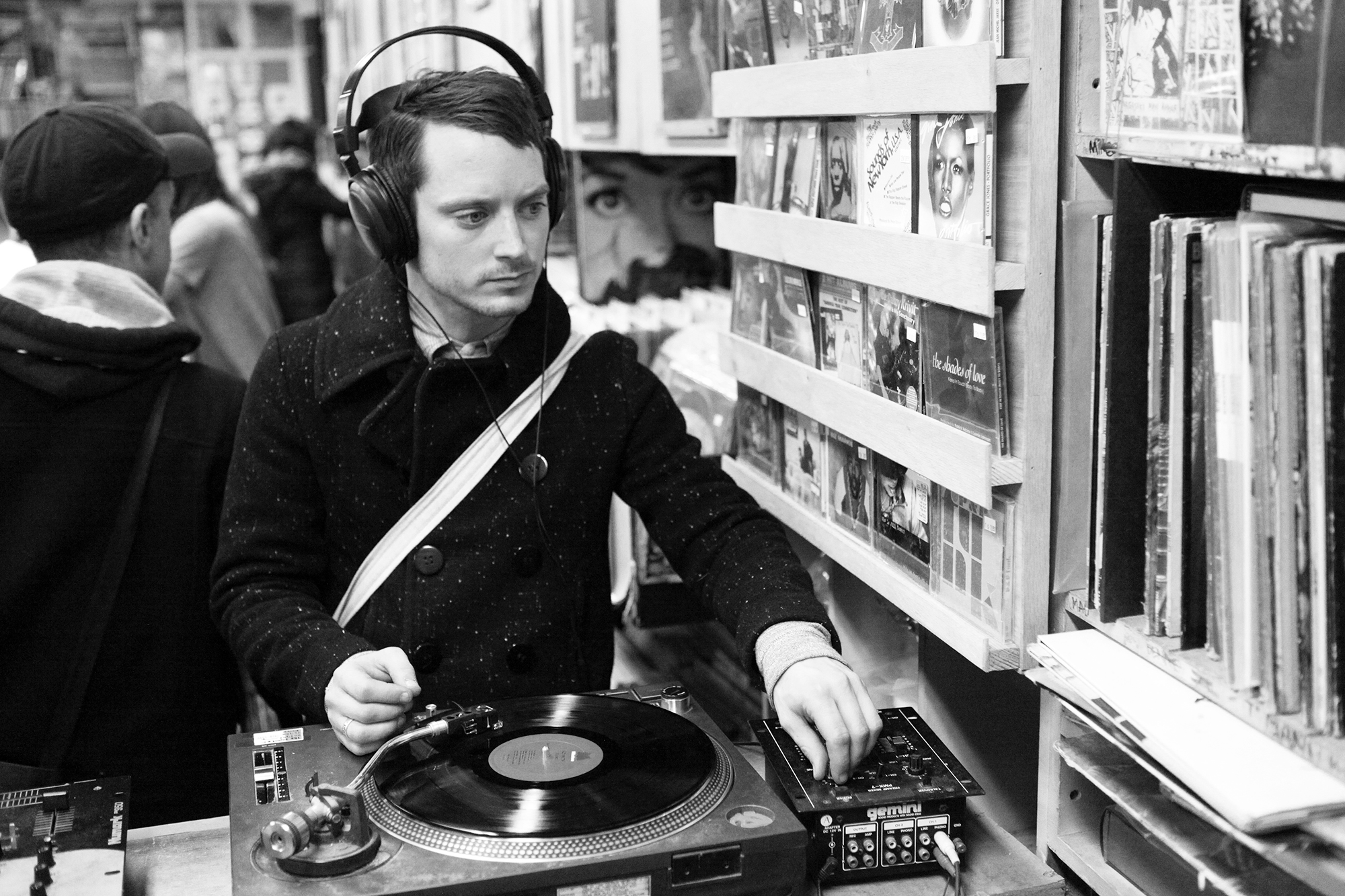 PHOTO: Elijah Wood is pictured listening to a vinyl record at A1 Records in New York City on Jan. 19, 2015. 